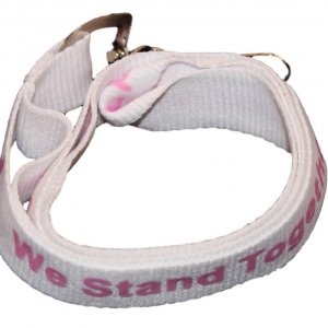 White lanyard with pink "We Stand Together" text and pink awareness ribbons