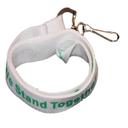 White lanyard with green "We Stand Together" text and green awareness ribbons